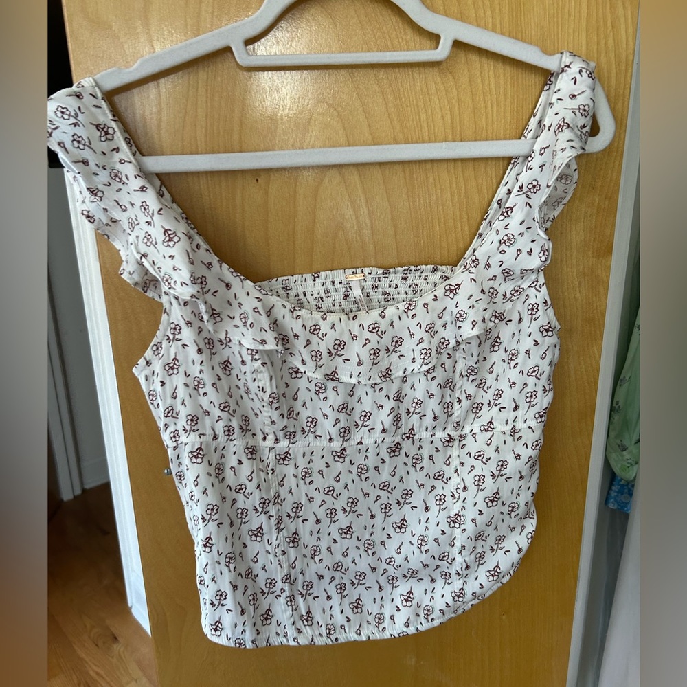 FREE PEOPLE FLORAL RUFFLE TANK TOP. Size medium excellent condition